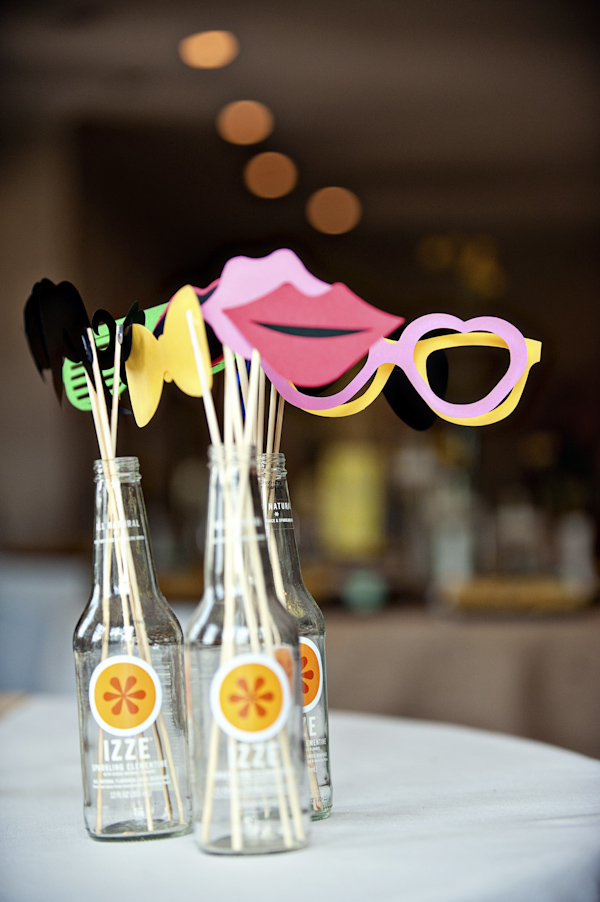 party favors sit in bottles on a table - wedding photo by top Atlanta based wedding photographers Scobey Photography